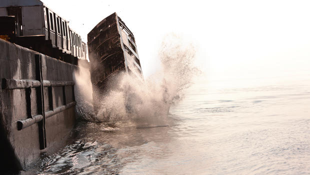 Surreal Photos of Subway Cars Being Thrown Into the Ocean
